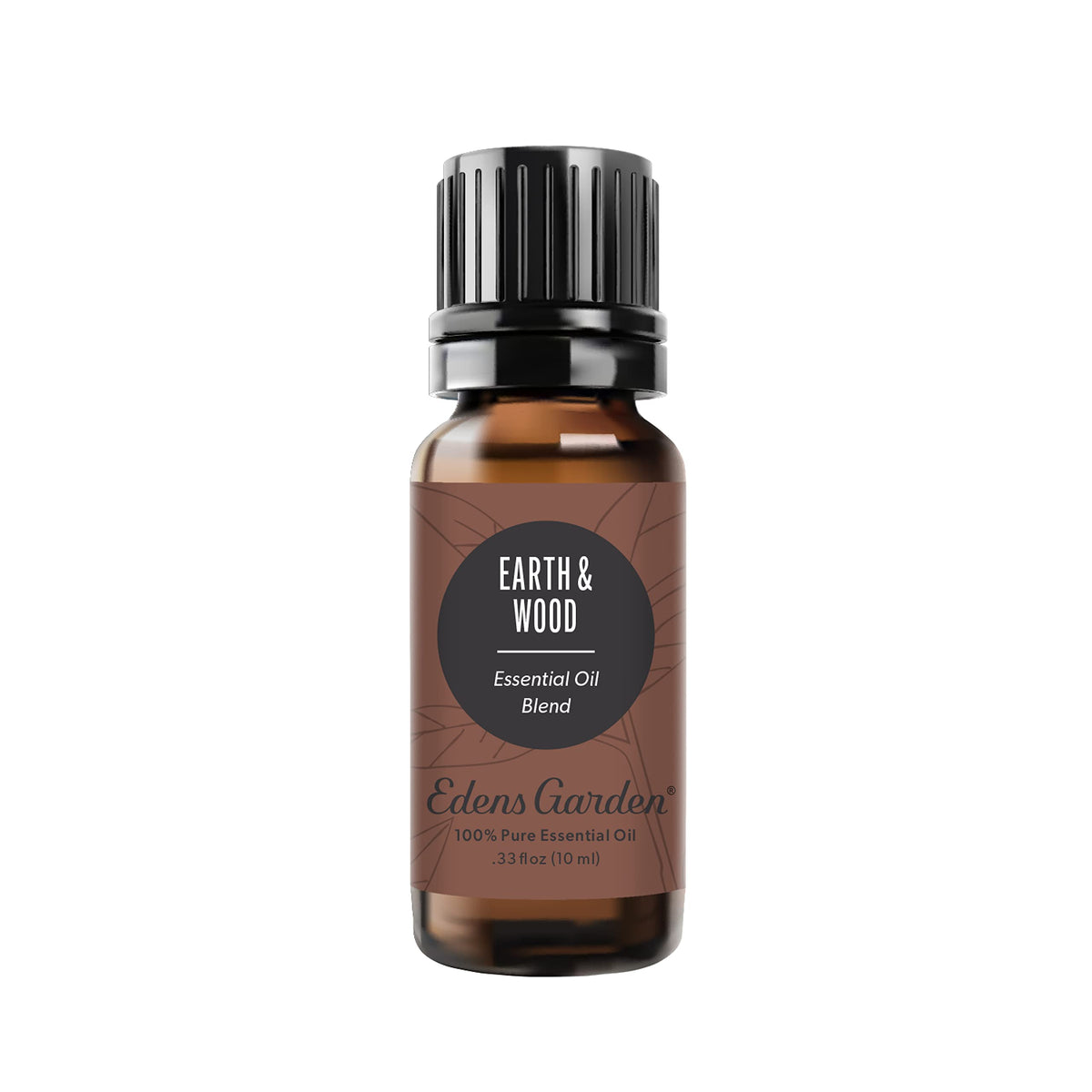 Edens Garden frasco frontal mostrando la mezcla Earth & Wood, ambiente natural