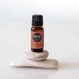Edens Garden detalle de etiqueta con ingredientes y pureza visible en la botella