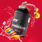 EFX Sports Karbolyn Fuel bote sobre mesa junto a toalla y botella de entrenamiento