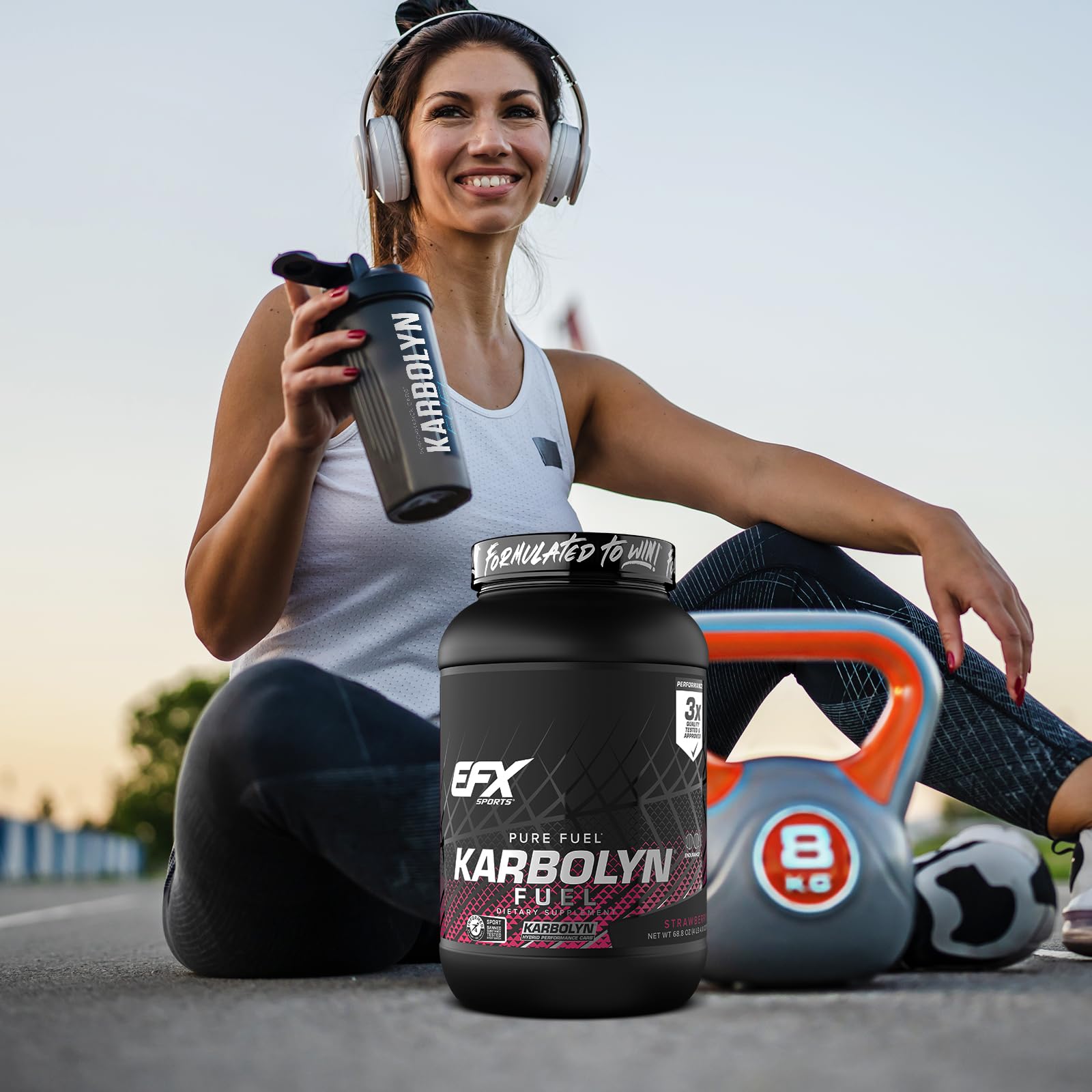 Bote Karbolyn Fuel EFX Sports junto a ropa de gimnasio ilustrando uso deportivo