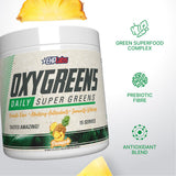 EHP Labs OxyGreens batido de piña en vaso, sabor refrescante listo para beber