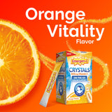 Emergen-C sobre junto a una regla para comparar tamaño portátil