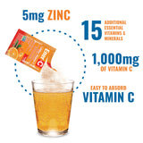 Ener-C polvo efervescente disolviéndose en vaso, hidratación rápida.