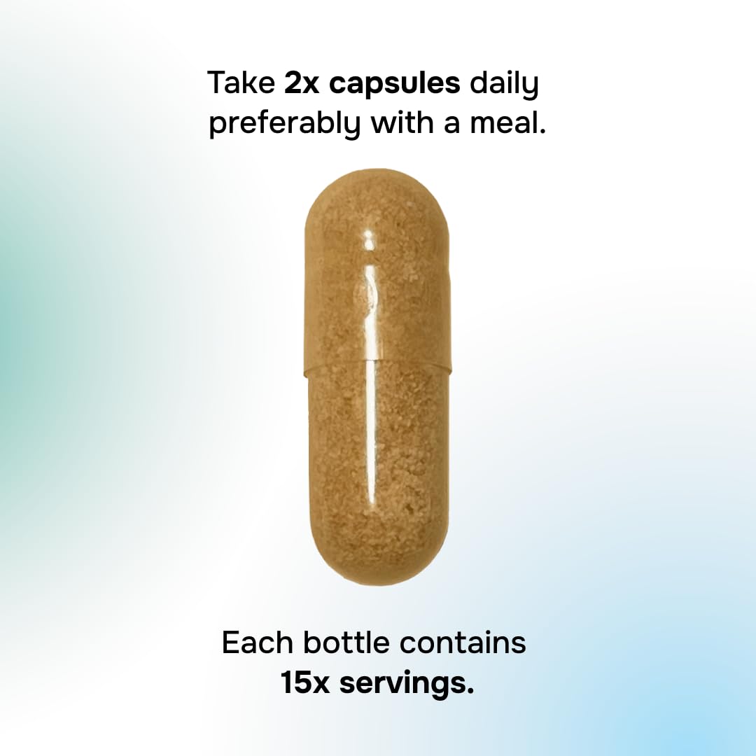 envitamin Coloslim cápsulas junto a vaso de agua indicando uso diario sencillo