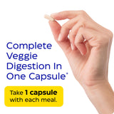 Enzymedica VeggieGest cápsulas sobre fondo claro mostrando tamaño real