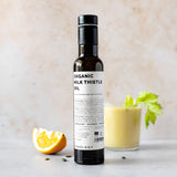 Erbology gotas de aceite de cardo mariano resaltando textura ligera y beneficios nutritivos