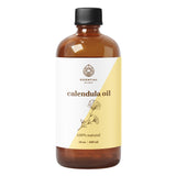 Essential Delights envase frontal de aceite de caléndula muestra etiqueta clara y volumen