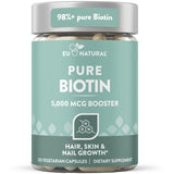 Eu Natural envase frontal mostrando Biotin 5000 mcg y beneficios visibles