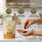 Everly Pumpkin softgels en mano para comparar tamaño y portabilidad