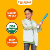 Feel Great madre aplicando gotas en rutina matutina de niño