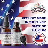 FLORIDA HERBS frasco de 60 ml frente a una mano, comparativa de tamaño y portabilidad