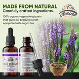 FLORIDA HERBS botella con cuentagotas en uso sobre mesa de rutina de bienestar