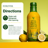 Forever Living en encimera de cocina con frutas cítricas, beneficio: integración en recetas