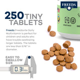 FREEDA freedavite tableta en mano para demostrar su portabilidad