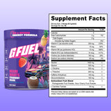 G Fuel en gimnasio junto a equipo, energía pre-entrenamiento sin azúcar