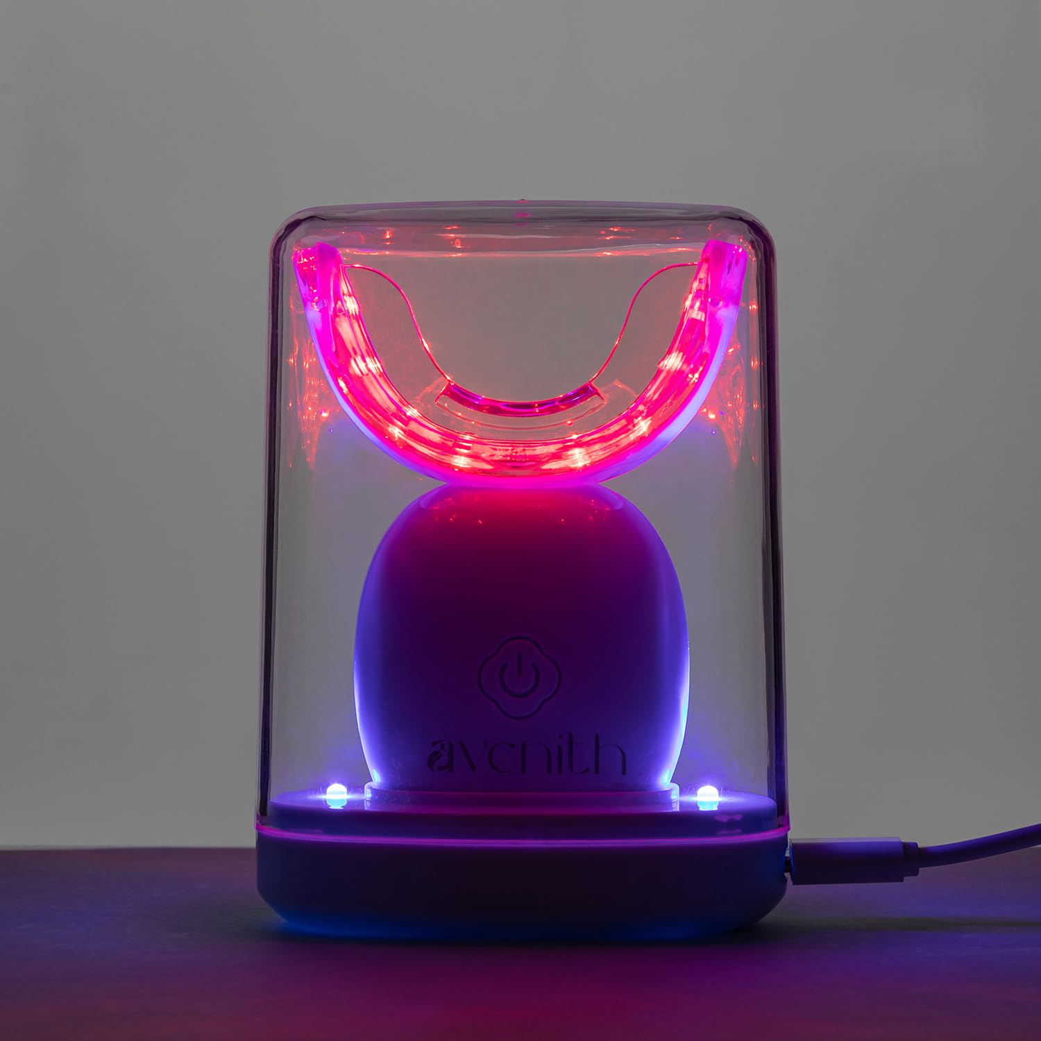 Generic dispositivo portátil frontal mostrando la pieza bucal y conectividad USB para conveniencia