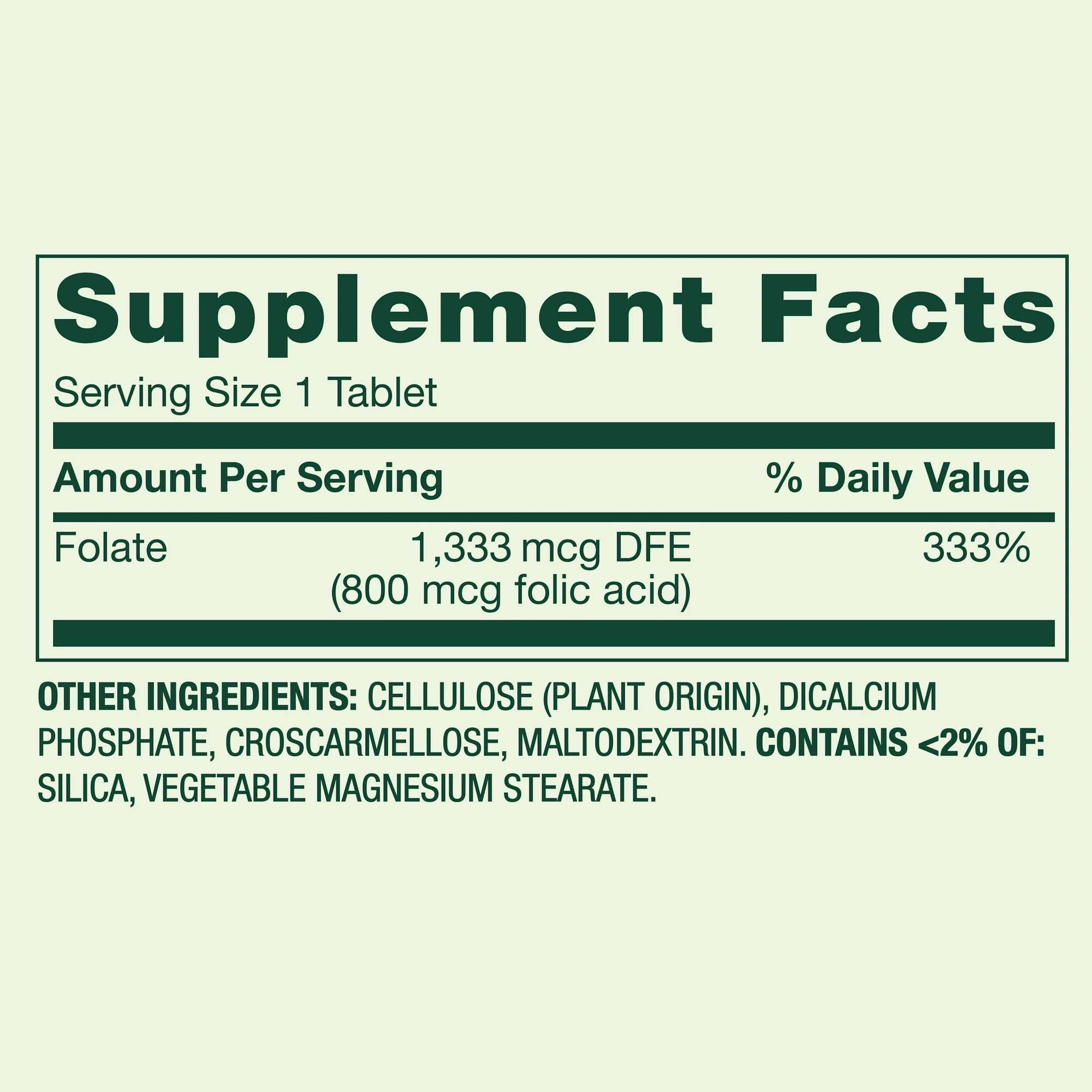 Generic primer plano de una tableta Folate mostrando textura y fácil ingestión