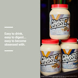 GHOST comparación de tamaño del envase 2.8LB con mano, evidencia de porciones y almacenamiento