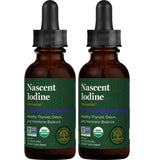 Global Healing Center frasco Detoxadine frente mostrando etiqueta y beneficio práctico