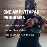 GNC Vitapak en rutina de mañana junto a botella y toallas para conveniencia