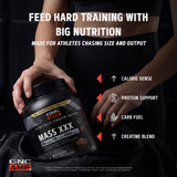 GNC AMP MASS XXX batido preparado en vaso listo para beber, muestra conveniencia post-entreno