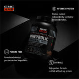 GNC comparación de tamaño del envase 59.4 oz y 26 porciones visibles