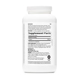 GNC primer plano de un comprimido de L Arginine 1000mg destacando tamaño y fácil ingestión