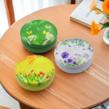 Golabarell velas sobre mesa de jardín como decoración funcional para cenas al aire libre