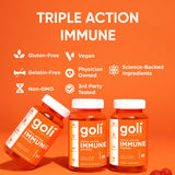 Escena de desayuno con Goli Immune junto a frutas y taza de té