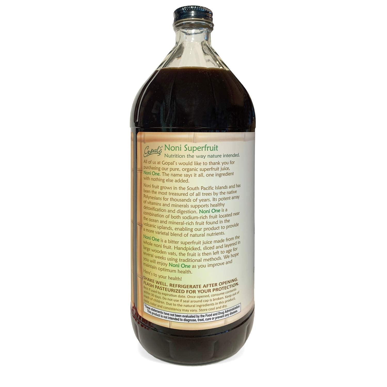 Gopal's botella de Noni One junto a una regla para mostrar tamaño y beneficio de cantidad