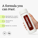 Graymatter vaso con bebida preparada que muestra energía y enfoque sostenido
