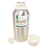 GreenHealth gota de aceite esencial de menta en primer plano destacando su pureza y brillo