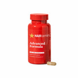 HAIRtamin envase frontal mostrando fórmula vegana y beneficio de cabello más fuerte