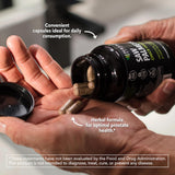 HAVASU NUTRITION cápsula sostenida en mano para referencia de escala
