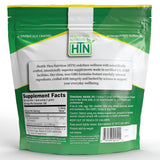 Health Thru Nutrition polvo disuelto en vaso mostrando fácil disolución y versatilidad