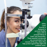 Health Thru Nutrition persona frente a pantalla usando el suplemento en rutina