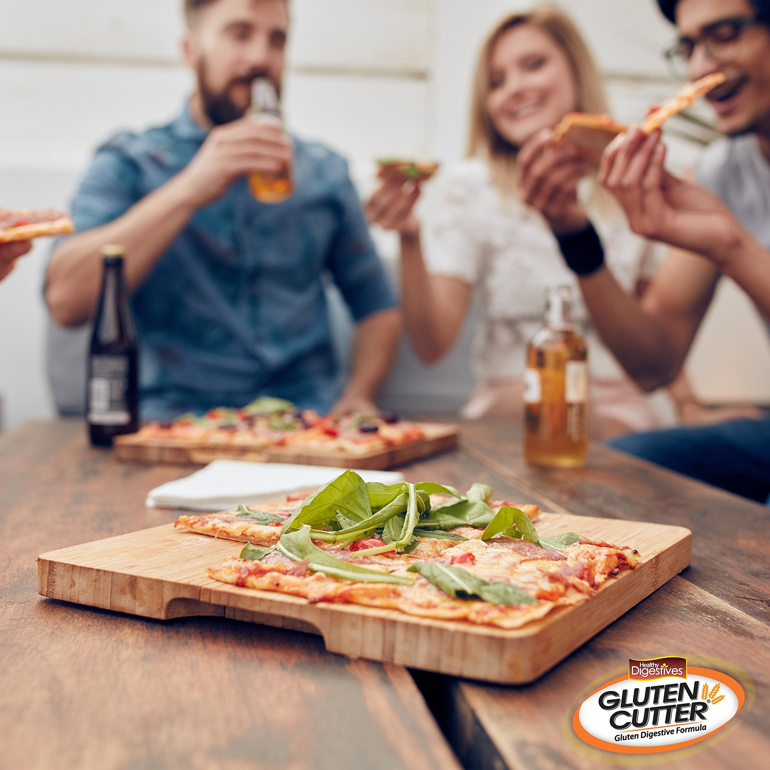 Botella de Gluten Cutter en una encimera de cocina junto a alimentos