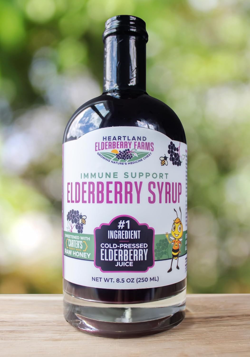 Heartland Elderberry Farms caja y botella en entorno doméstico como regalo