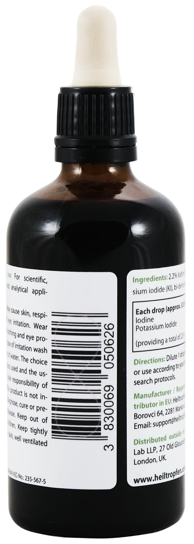 Heiltropfen botella junto a una regla para comparar tamaño y capacidad 100 ml