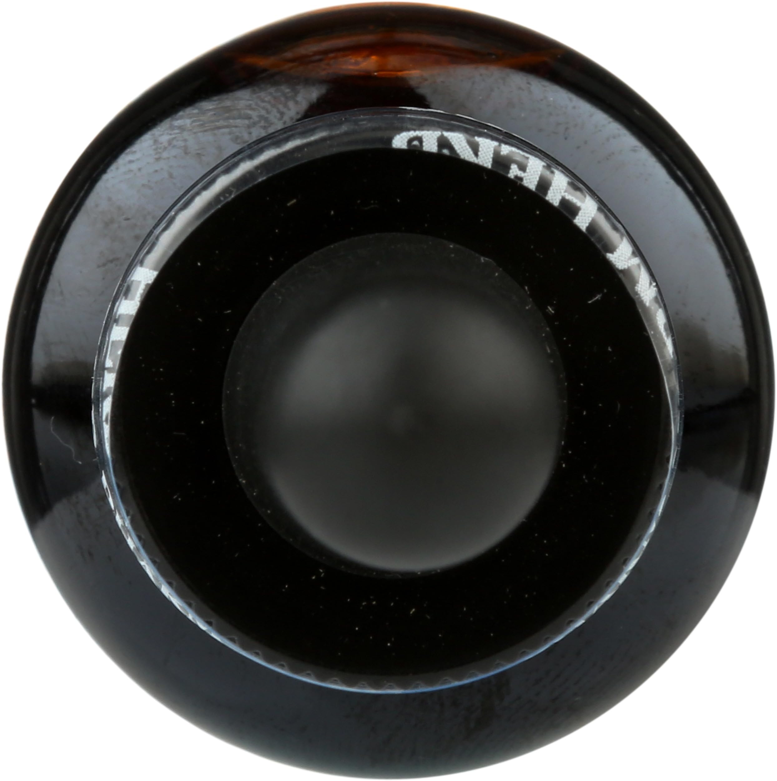 Herb Pharm frasco junto a regla para comparar tamaño 1 oz