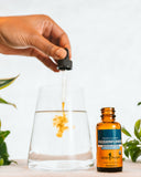 Herb Pharm frasco junto a una regla para comparar tamaño real