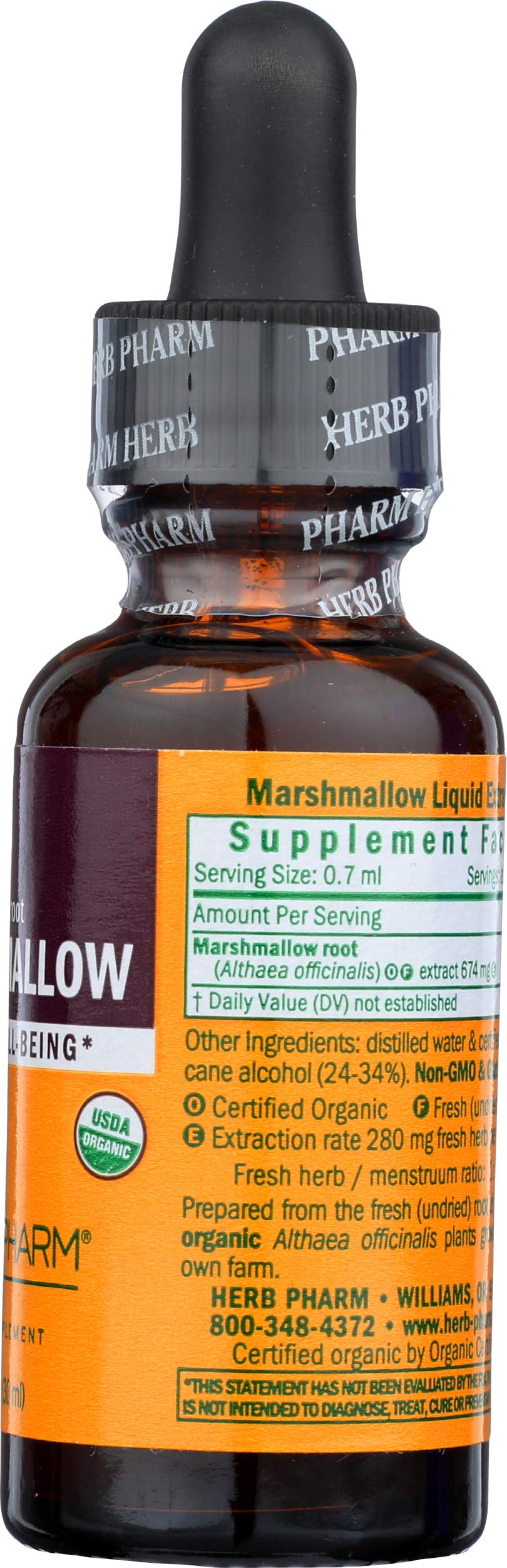 Herb Pharm frasco 1 oz en mano para comparar tamaño y uso práctico diario