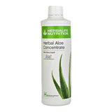 Herbalife botella frente mostrando etiqueta clara y beneficio digestivo