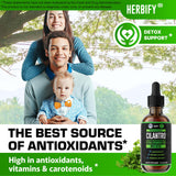 HERBIFY botella junto a mano para comparar tamaño y duración del producto