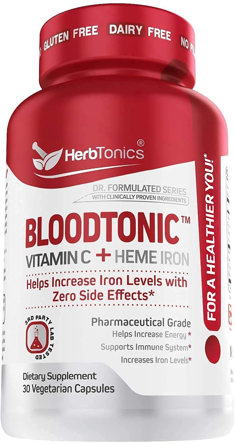 Herbtonics mujer activa usando el suplemento para energía sostenida