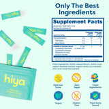 HIYA stick pack en mano de niño mostrando dosis individual y conveniencia