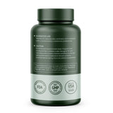 Primer plano de una cápsula HMS Nutrition resaltando textura vegana y pureza