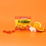 Honey Stinger en uso por corredor, energía rápida en carrera