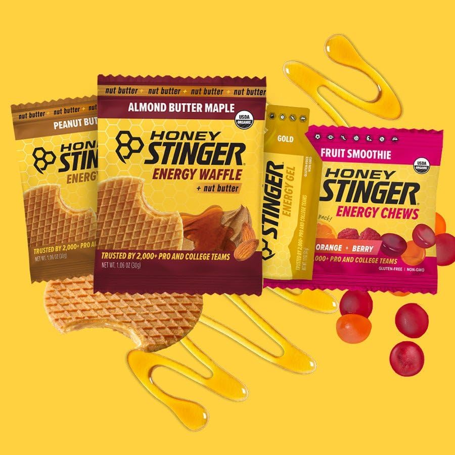 Honey Stinger gel en mano durante carrera ofrece energía rápida práctica