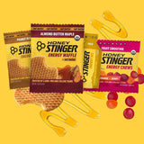 Honey Stinger gel en mano durante carrera ofrece energía rápida práctica